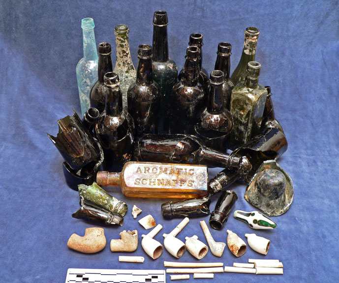 Alcohol bottles and tobacco pipes