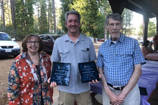 Linda Jack (L) and David Bard (R) of the Nevada County Historical Society present Mark Selverston (M) with the Distinguished Service Award.